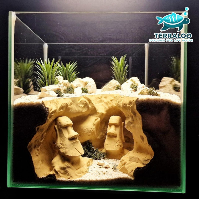 Planted freshwater aquarium with dense green foreground and driftwood